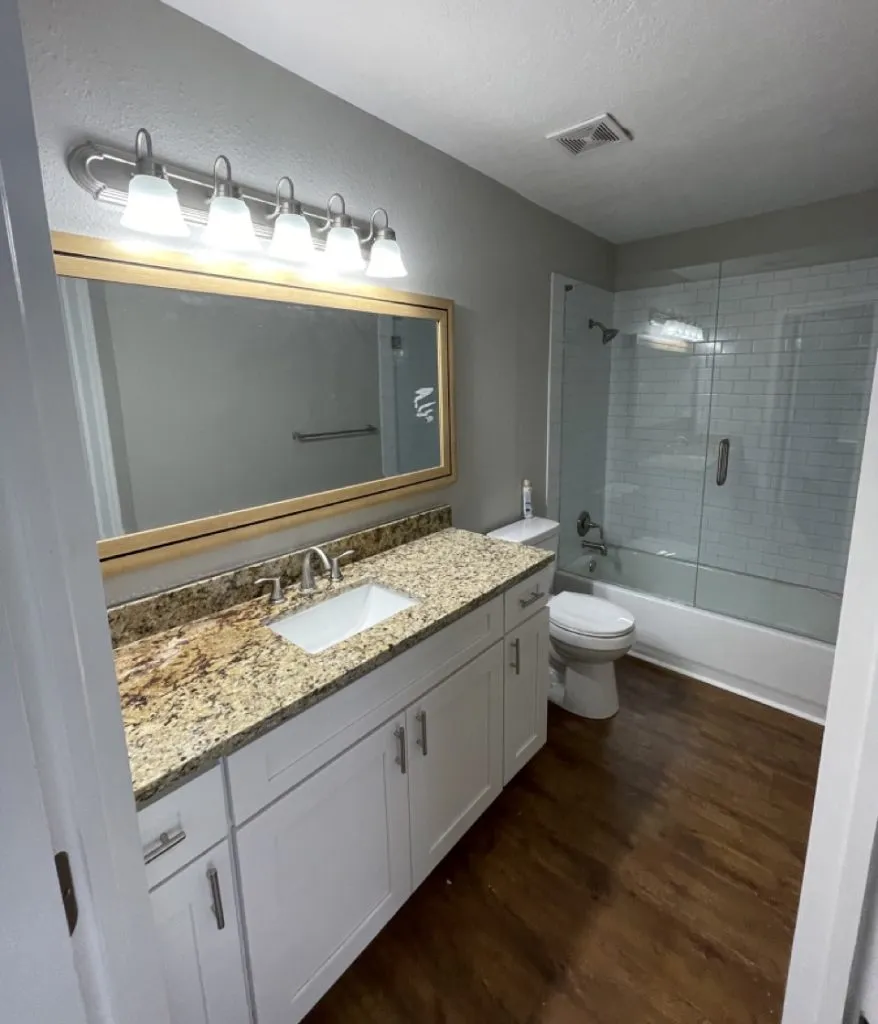Bathroom renovation with updated tile and fixtures