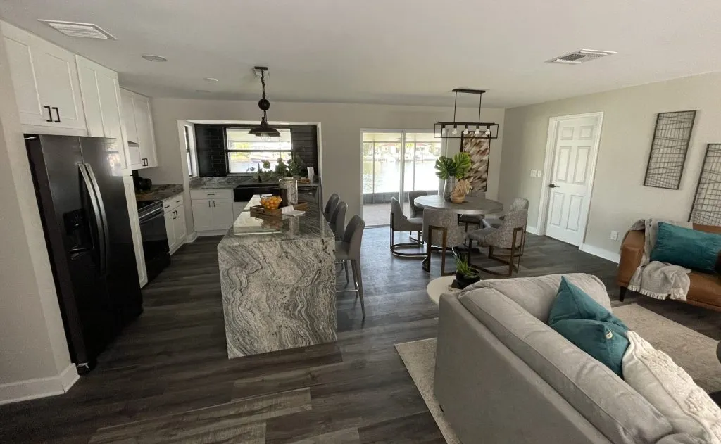 Open-plan kitchen and living room finished by Tactical Construction Group